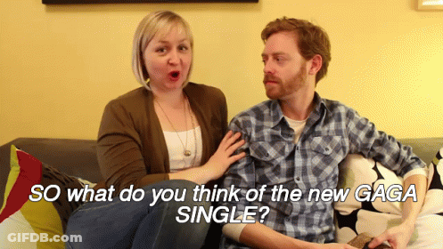 Man And Woman On Couch Saying So What Do You Think Of The New Gaga Single GIF