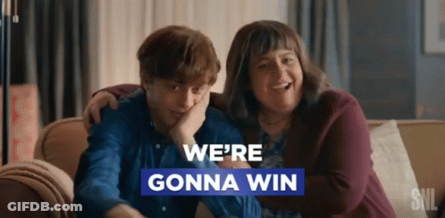 Man And Woman On Couch We're Gonna Win GIF