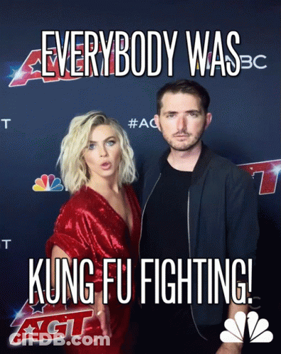 Man And Woman On Red Carpet Saying Kung Fu Fighting GIF