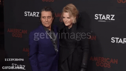 Man And Woman On Red Carpet Saying Starz GIF