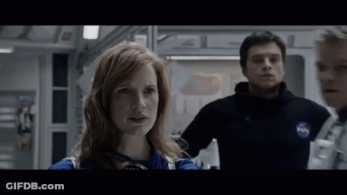 Man And Woman On Spaceship GIF