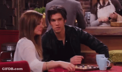 Man And Woman Playing Chess GIF