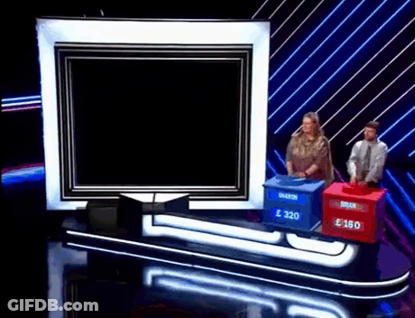 Man And Woman Playing Game On Stage With Boxes Brian And 320 GIF
