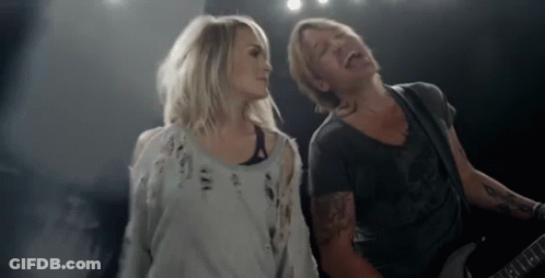 Man And Woman Playing Guitars GIF