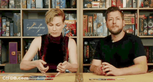 Man And Woman Playing Moonrakers Board Game GIF
