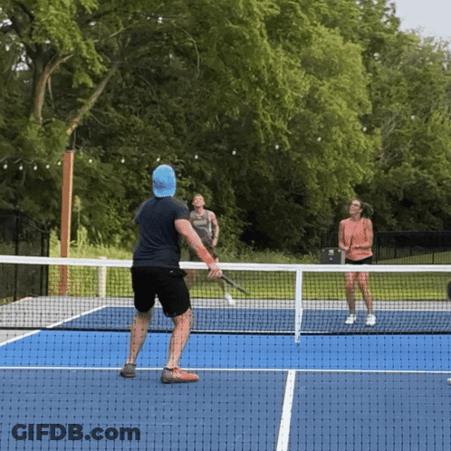 Man And Woman Playing Tennis GIF