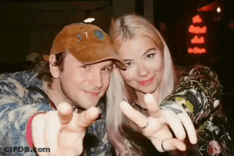 Man And Woman Pointing At Camera GIF