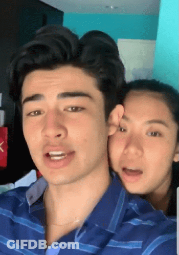Man And Woman Posing GIF