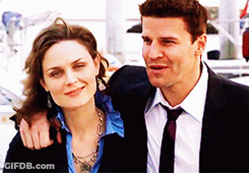 Man And Woman Posing For Picture GIF