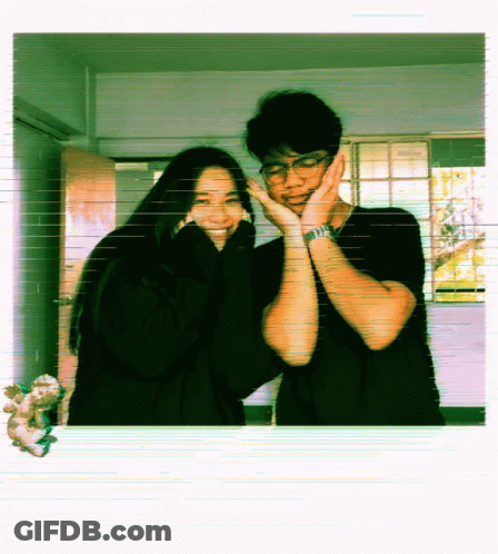 Man And Woman Posing For Picture GIF