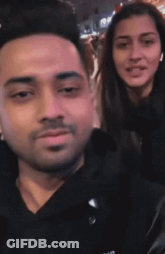 Man And Woman Posing GIF