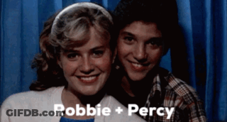 Man And Woman Posing Robbie + Percy GIF