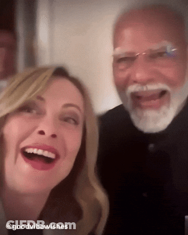 Man And Woman Posing Saying Goodvibewishes GIF