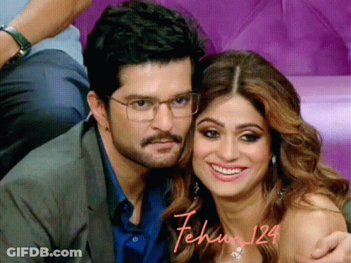 Man And Woman Posing With Fehu GIF