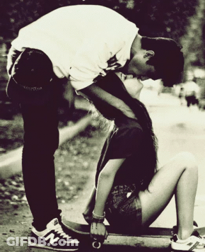 Man And Woman Posing With Tongue Out GIF