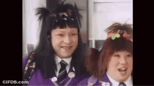 Man And Woman Posing, Woman In Wig GIF