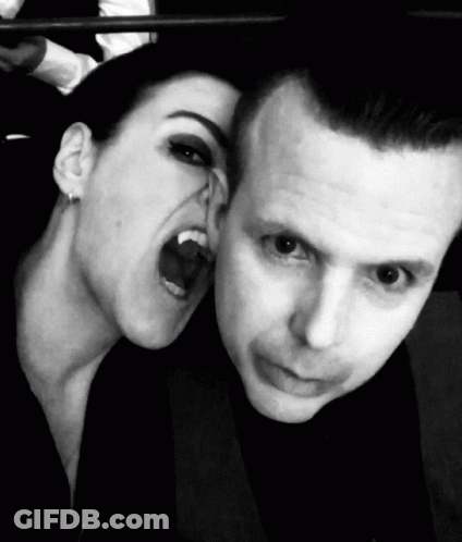 Man And Woman Posing Woman Screaming GIF