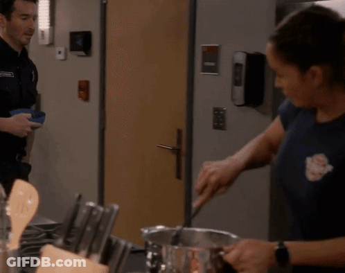 Man And Woman Preparing Food In Kitchen GIF