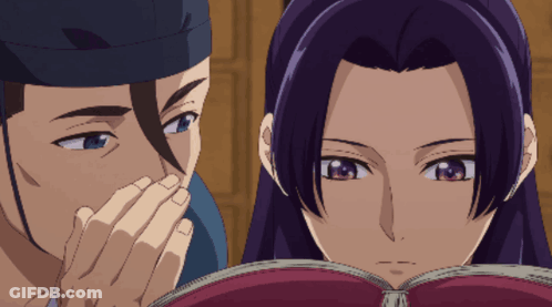 Man And Woman Reading Book Together GIF