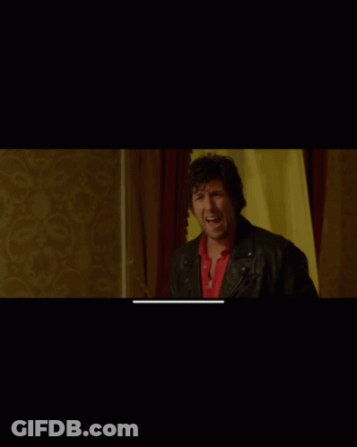 Man And Woman Reflected In Window GIF