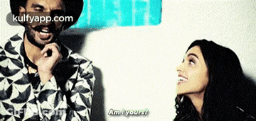 Man And Woman Saying Am I Yours GIF