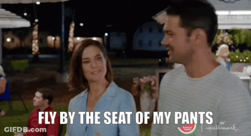 Man And Woman Saying Fly By The Seat Of My Pants GIF