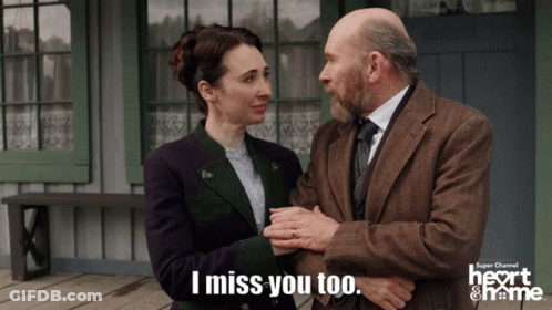 Man And Woman Saying I Miss You Too GIF