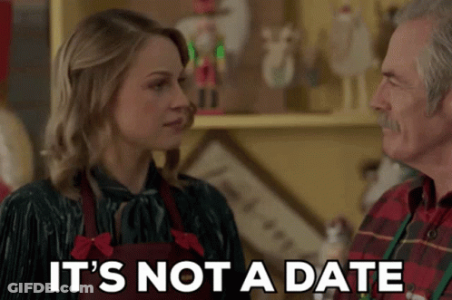 Man And Woman Saying It's Not A Date GIF