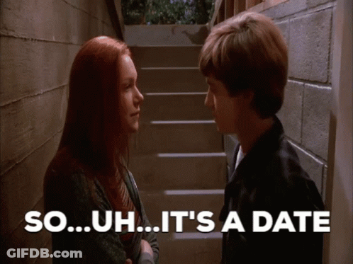 Man And Woman Saying So Uh It's A Date GIF