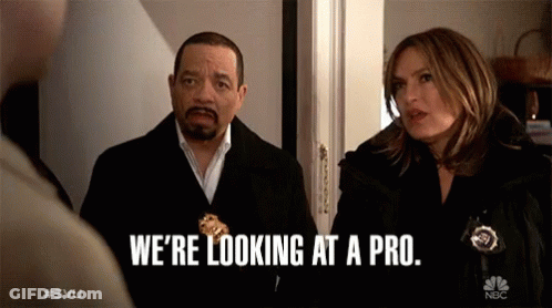 Man And Woman Saying We're Looking At A Pro GIF