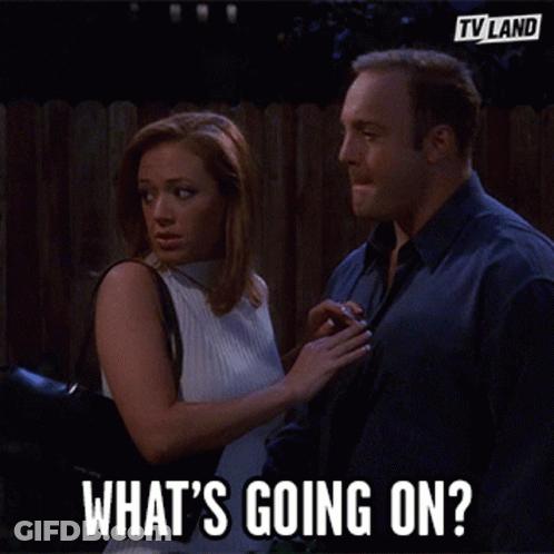 Man And Woman Saying What's Going On GIF