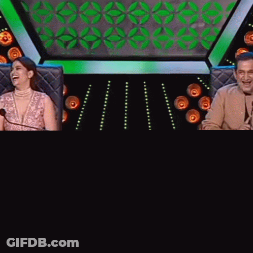 Man And Woman Singing At Microphones GIF