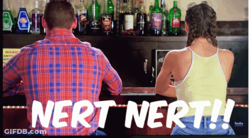 Man And Woman Sitting At Bar With Nert Nert GIF