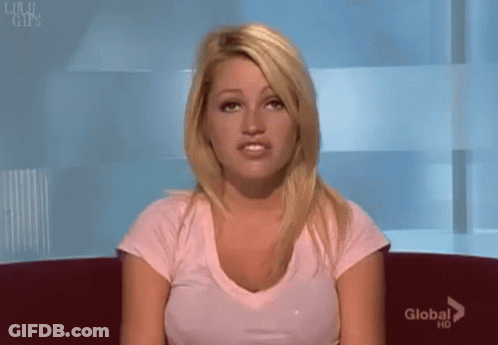 Man And Woman Sitting At Table GIF