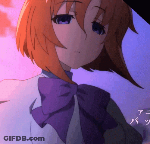 Man And Woman Sitting At Table In Front Of Crowd GIF