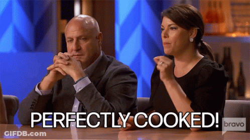 Man And Woman Sitting At Table GIF