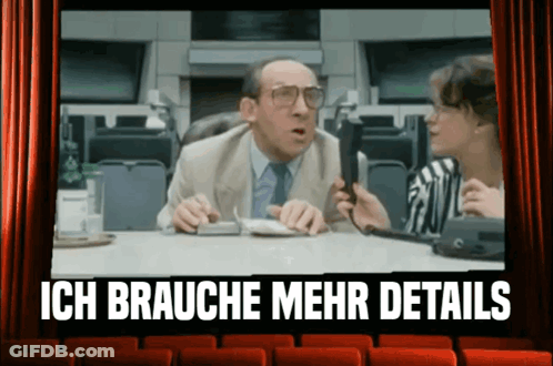 Man And Woman Sitting At Table GIF