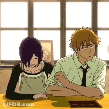 Man And Woman Sitting At Table With Folded Hands GIF