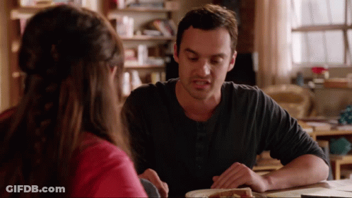 Man And Woman Sitting At Table With Food GIF