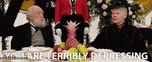 Man And Woman Sitting At Table With You Are Terribly Depressing GIF