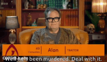 Man And Woman Sitting At Table Woman In Yellow Dress And Earrings GIF