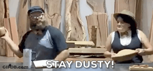 Man And Woman Sitting At Woodworking Shop GIF