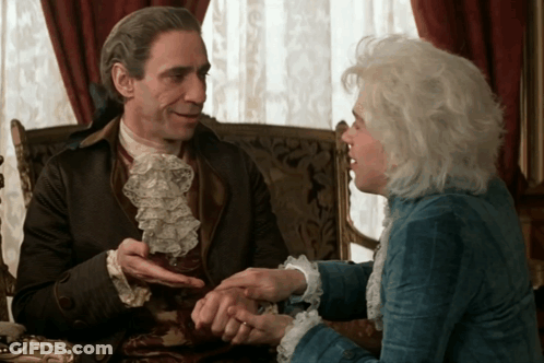 Man And Woman Sitting Holding Hands GIF
