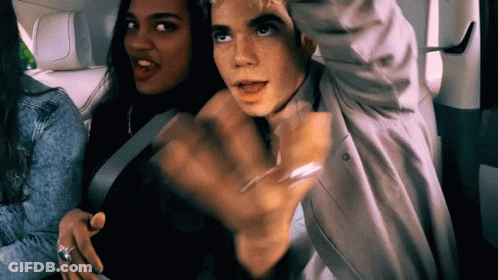 Man And Woman Sitting In Back Seat Arms Outstretched GIF
