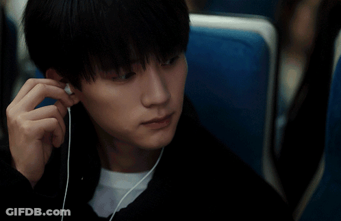 Man And Woman Sitting In Blue Seats GIF