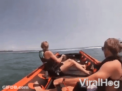 Man And Woman Sitting In Boat GIF
