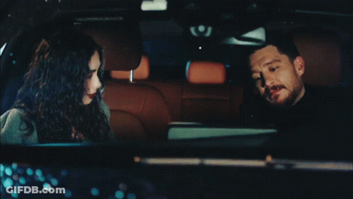 Man And Woman Sitting In Car GIF