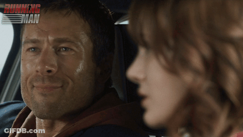 Man And Woman Sitting In Car Saying Running Man GIF