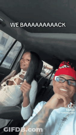 Man And Woman Sitting In Car With Caption We Baaaaaaack GIF