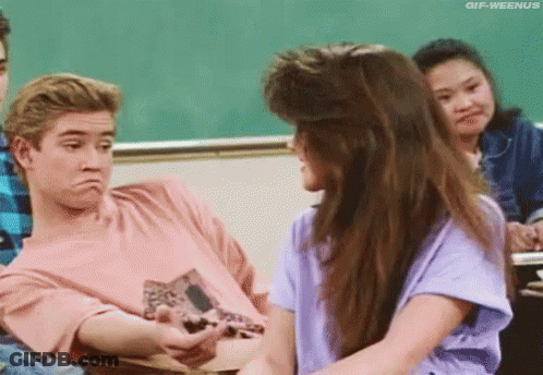 Man And Woman Sitting In Classroom Looking At Each Other GIF